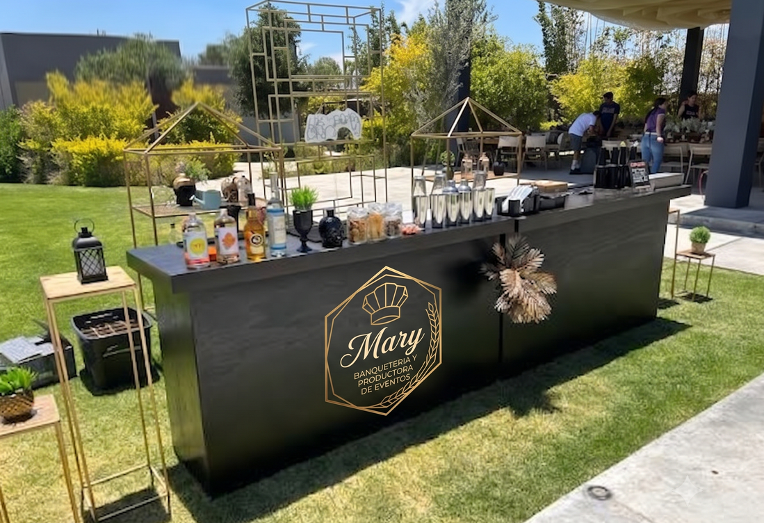 Barra de tragos iluminada en evento nocturno